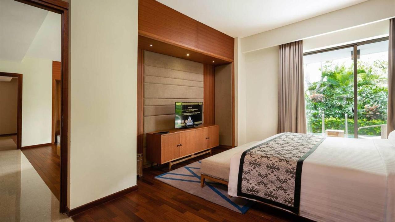 Merusaka Nusa Dua Exterior foto A bedroom at the hotel